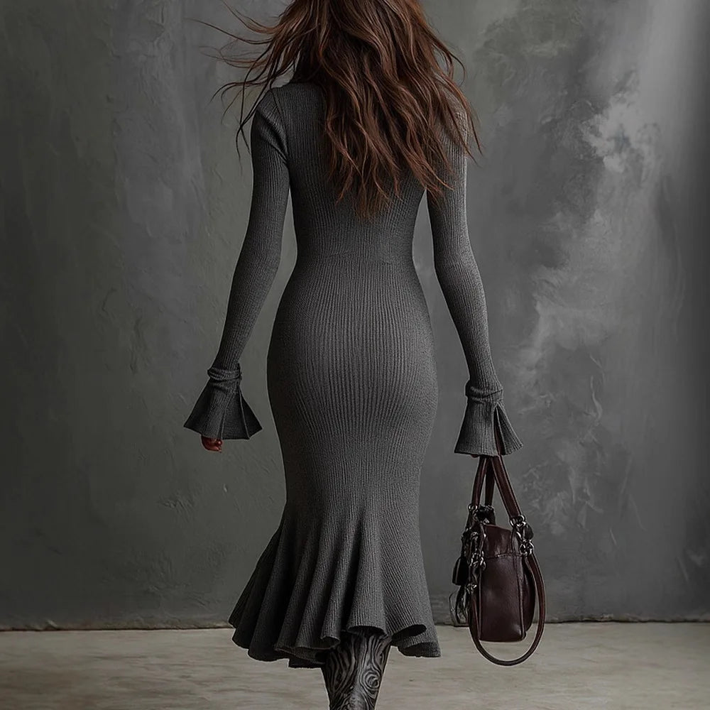 VESTIDO MIDI ENTALLADO DE PUNTO CON CREMALLERA FRONTAL