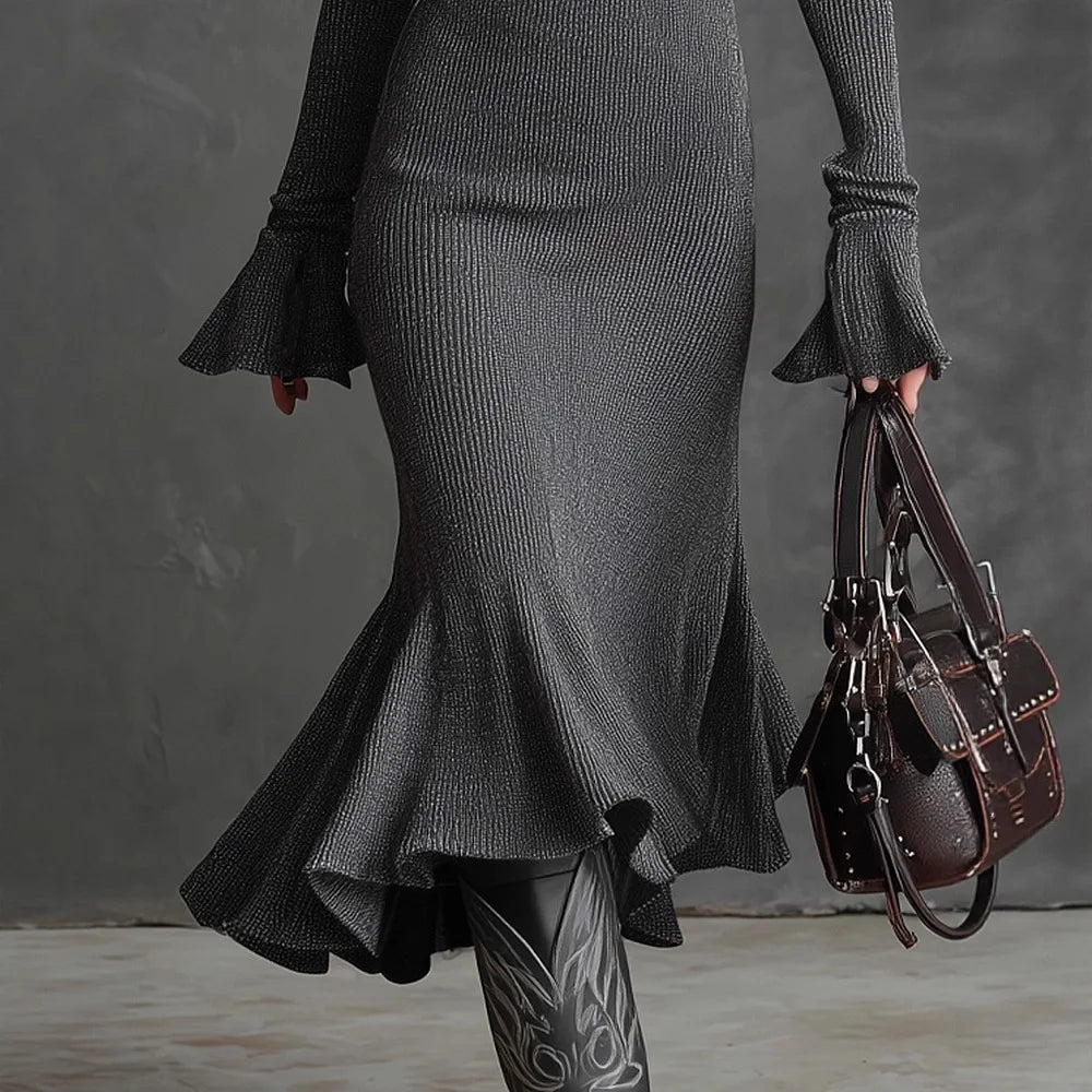 VESTIDO MIDI ENTALLADO DE PUNTO CON CREMALLERA FRONTAL